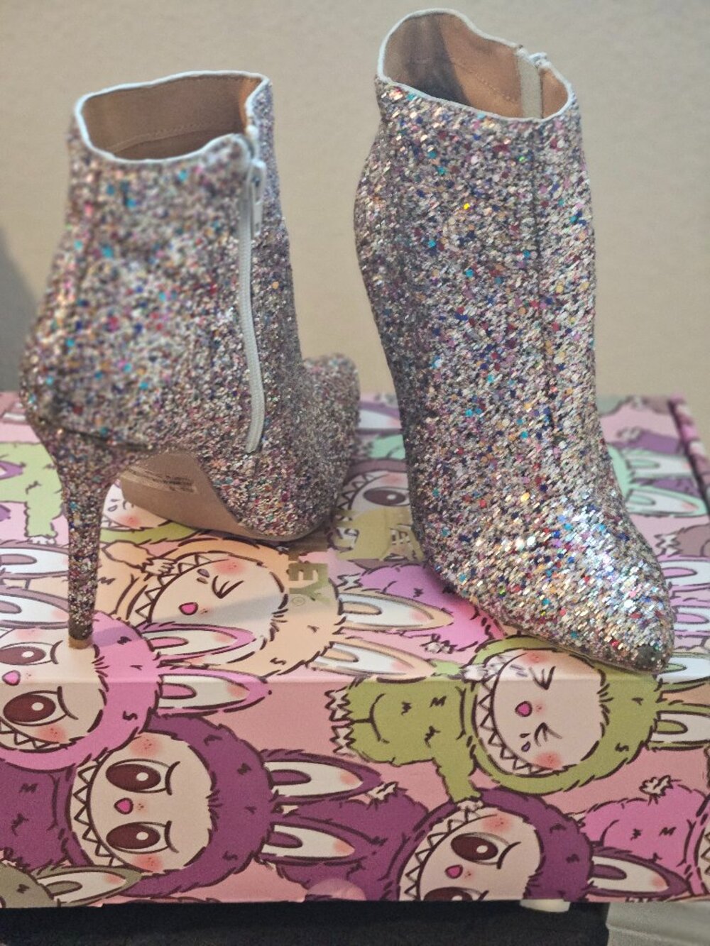 Ankle pointy toe sparkly boots.